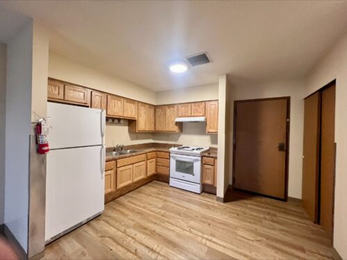 The kitchen in a living space offered through affordable housing services